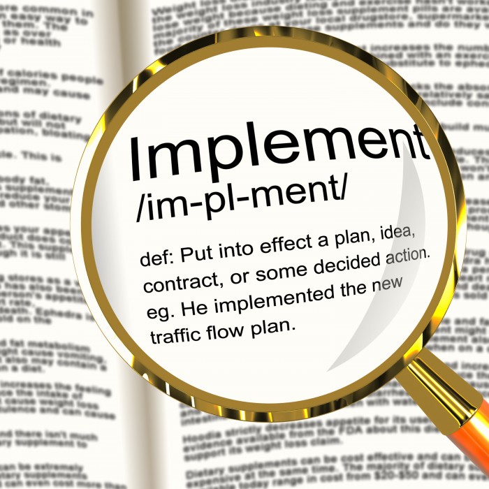 implement-definition-magnifier-showing-executing-or-carrying-out-a-plan